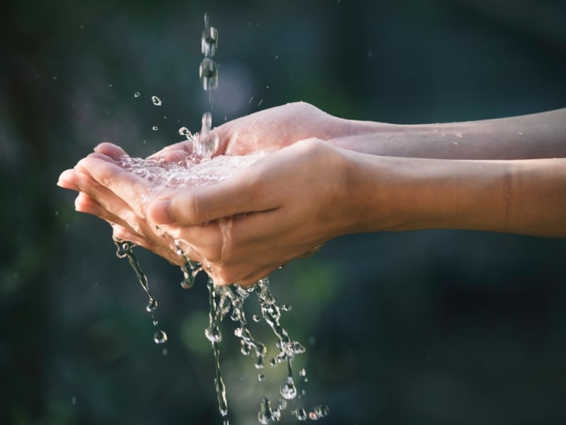 Hands catching fresh water outdoors – Important Update for Developers in the Hunter Region.