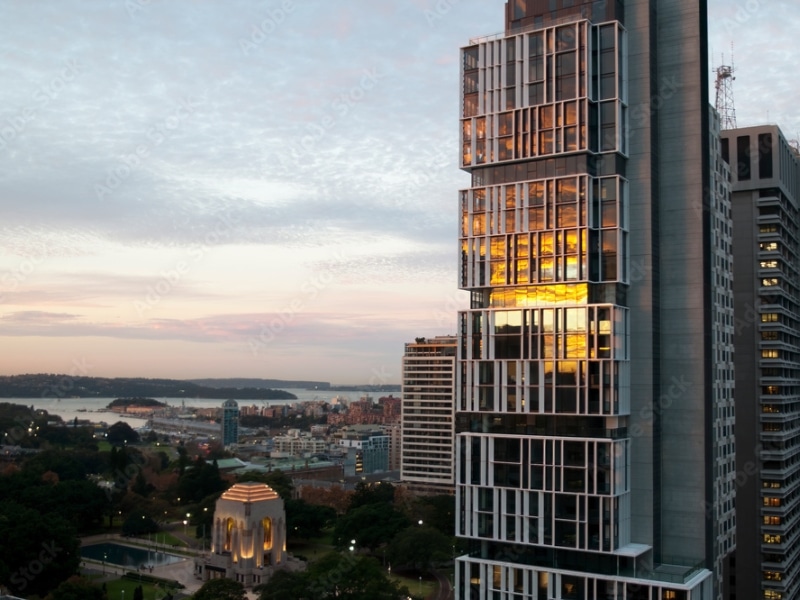 Modern high-rise building in Sydney CBD at sunset, ideal for visualising SEARS assessment in urban development planning