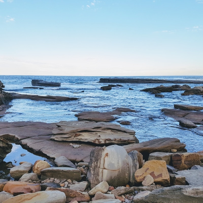 Coastal rock formations illustrating natural considerations in the Town Planning Process on the Central Coast.