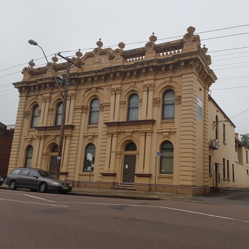 Ornate heritage building from 1892 in Maitland, highlighting historic preservation in Town Planning in Maitland