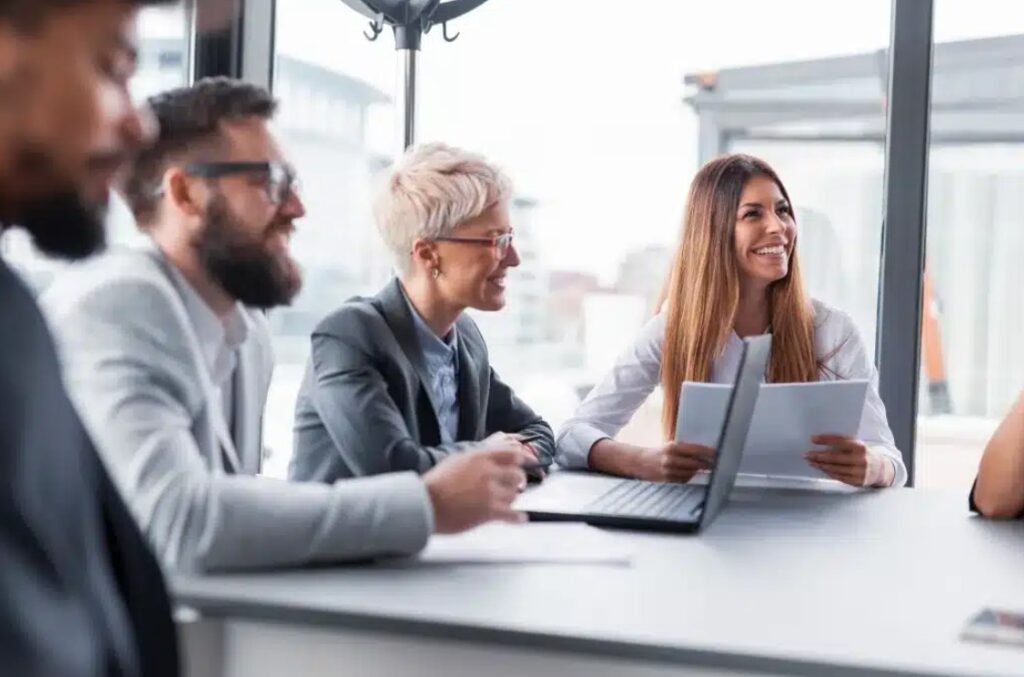 Team collaborating on a social impact assessment for state significant and regional projects, schools, and renewable energy developments.